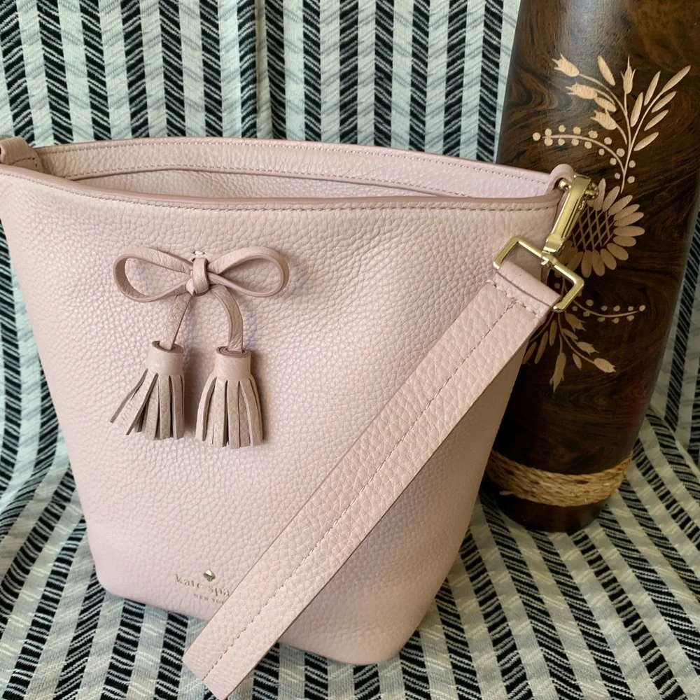 MAKE AN OFFER Hayes street Vanessa warm vellum Kate Spade bucket - Picture 1 of 8